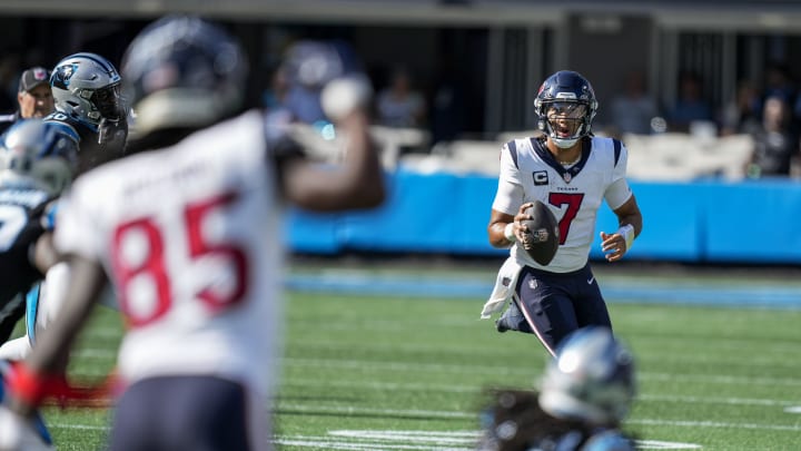 Oct 29, 2023; Charlotte, North Carolina, USA; Houston Texans quarterback C.J. Stroud (7) looks to pass to wide receiver Noah Brown (85) against the Carolina Panthers during the second half at Bank of America Stadium. Mandatory Credit: Jim Dedmon-USA TODAY Sports