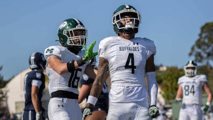 Manteca's Quinn Martinez (4) and Micah Cardoza (16) are all fired up during a big 15-14 win at North Coast Section power Marin Catholic on Sept. 13. Manteca (8-0) moved into the High School On SI Top 25 California football rankings this week. 
