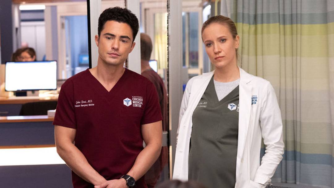 CHICAGO MED -- "Spill Your Guts" Episode 1112 -- Pictured: (l-r) Darren Barnet as Dr. John Frost, Jessy Schram as Dr. Hannah Asher