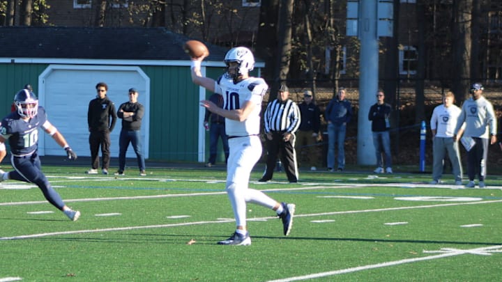 Keegan Croucher throws a pass during a game for the Cheshire Academy football team in 2024.