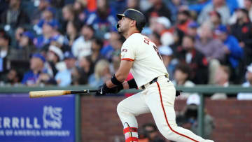 Jun 26, 2024; San Francisco, California, USA; San Francisco Giants left fielder Michael Conforto (8) hits a home run against the Chicago Cubs during the second inning at Oracle Park.