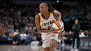 Aug 1, 2025; Dallas, Texas, USA; Indiana Fever guard Kelsey Mitchell (0) in action during the game between the Dallas Wings and the Indiana Fever at the American Airlines Center. Mandatory Credit: Jerome Miron-Imagn Images