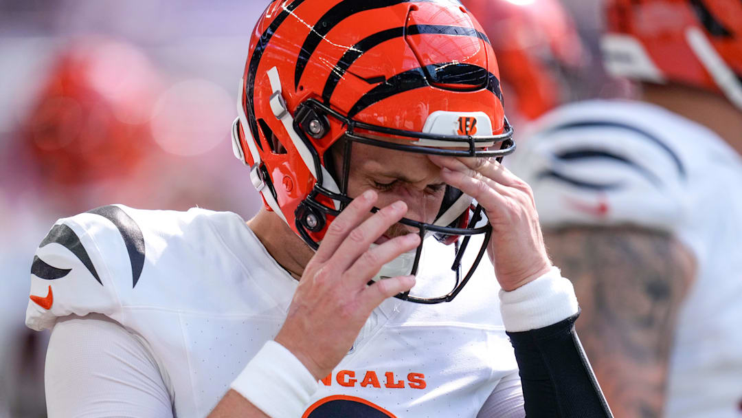Cincinnati Bengals quarterback Jake Browning (6) pulls his helmet on in the first quarter of the NFL Week 3 game between the Minnesota Vikings and the Cincinnati Bengals at U.S. Bank Stadium in Minneapolis on Sunday, Sept. 21, 2025.