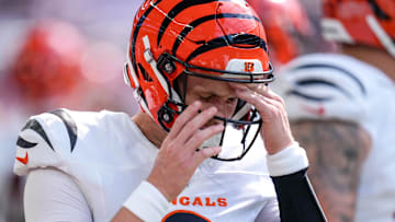 Cincinnati Bengals quarterback Jake Browning (6) pulls his helmet on in the first quarter of the NFL Week 3 game between the Minnesota Vikings and the Cincinnati Bengals at U.S. Bank Stadium in Minneapolis on Sunday, Sept. 21, 2025.