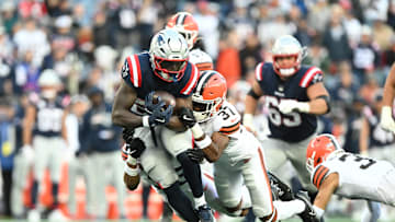 Oct 26, 2025; Foxborough, Massachusetts, USA;  New England Patriots running back Terrell Jennings (26) is tackled by Cleveland Browns cornerback Dom Jones (37) during the fourth quarter at Gillette Stadium. Mandatory Credit: Brian Fluharty-Imagn Images