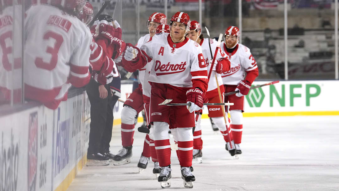 Patrick Kane leads the Detroit Red Wings in celebration during the 2025 NHL Stadium Series between the Red Wings and the Columbus Blue Jackets.