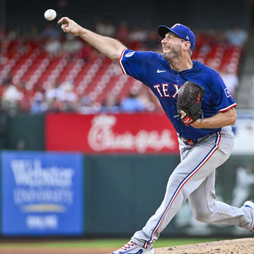 Jul 30, 2024; St. Louis, Missouri, USA;  Texas Rangers starting pitcher Max Scherzer (31) pitches against the St. Louis Cardinals during the first inning at Busch Stadium. 