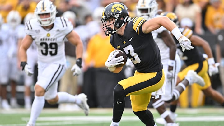 Sep 16, 2023; Iowa City, Iowa, USA; Iowa Hawkeyes defensive back Cooper DeJean (3) returns a punt as Western Michigan Broncos linebacker Nate Norris (39) pursues during the second quarter at Kinnick Stadium. Mandatory Credit: Jeffrey Becker-Imagn Images