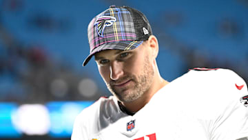 Oct 13, 2024; Charlotte, North Carolina, USA; Atlanta Falcons quarterback Kirk Cousins (18) walks off the field after the game at Bank of America Stadium. Mandatory Credit: Bob Donnan-Imagn Images