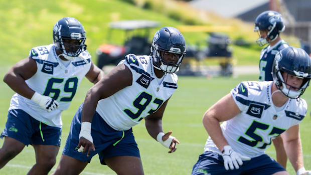 Seattle Seahawks defensive lineman Anthony Campbell, defensive lineman Bubba Thomas and linebacker Connor O'Toole. Seattle Seahawks defensive lineman Anthony Campbell, defensive lineman Bubba Thomas and linebacker Connor O'Toole.