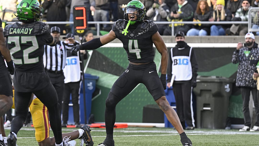 Nov 22, 2025; Eugene, Oregon, USA; Oregon Ducks defensive back Brandon Finney (4) celebrates after breaking a pass play against the Southern California Trojans during the first half at Autzen Stadium. Mandatory Credit: Troy Wayrynen-Imagn Images