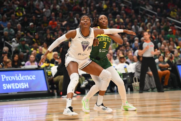Golden State Valkyries center Temi Fagbenle locks out Seattle Storm forward Nneka Ogwumike. 