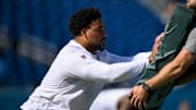 Sep 15, 2024; Nashville, Tennessee, USA; New York Jets guard Alijah Vera-Tucker (75) during pregame warmups against the Tennessee Titans  at Nissan Stadium. 