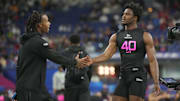 Feb 28, 2025; Indianapolis, IN, USA;  South Carolina defensive back Nick Emmanwori (DB40) greets Texas defensive back Jahdae Barron (DB04)  during the 2025 NFL Combine at Lucas Oil Stadium. Mandatory Credit: Kirby Lee-Imagn Images