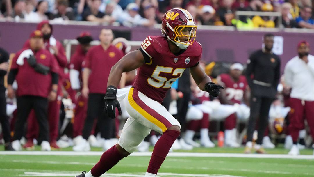 Oct 4, 2026; Tottenham, ENG;  Washington Commanders linebacker Sonny Styles (52) runs on the field during the third quarter against the Indianapolis Colts at Tottenham Hotspur Stadium.  Mandatory Credit: Kirby Lee-Imagn Images