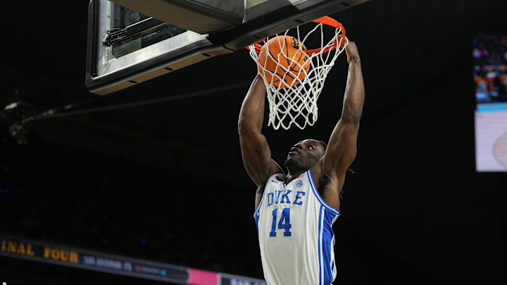 Apr 5, 2025; San Antonio, TX, USA; Duke Blue Devils guard Sion James (14) dunks during the second half in the semifinals of the men's Final Four of the 2025 NCAA Tournament at the Alamodome. Apr 5, 2025; San Antonio, TX, USA; Duke Blue Devils guard Sion James (14) dunks during the second half in the semifinals of the men's Final Four of the 2025 NCAA Tournament at the Alamodome.