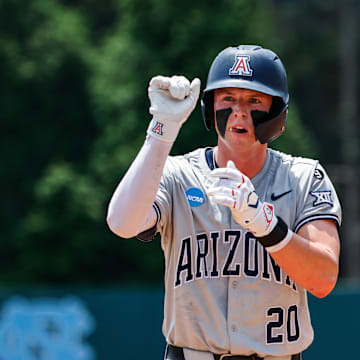 Jun 8, 2025; Chapel Hill, NC, USA;  Arizona catcher Tommy Splaine (20) celebrates being on base during the first inning of the Super Regionals game against North Carolina in Chapel Hill, North Carolina. Mandatory Credit: Jaylynn Nash-Imagn Images