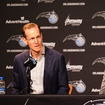 Orlando Magic president of basketball operations Jeff Weltman (left) and second round draft pick Caleb Houstan (right) during a press conference at the Amway Center. 