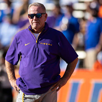 Nov 16, 2024; Gainesville, Florida, USA; LSU Tigers head coach Brian Kelly looks on before a game against the Florida Gators at Ben Hill Griffin Stadium. Mandatory Credit: Matt Pendleton-Imagn Images