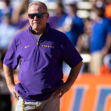 Nov 16, 2024; Gainesville, Florida, USA; LSU Tigers head coach Brian Kelly looks on before a game against the Florida Gators at Ben Hill Griffin Stadium. Mandatory Credit: Matt Pendleton-Imagn Images