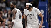 Feb 8, 2025; Dallas, Texas, USA; Dallas Mavericks forward Anthony Davis (3) and guard Kyrie Irving (11) celebrates after Davis dunks the ball during the game between the Dallas Mavericks and the Houston Rockets at the American Airlines Center. Mandatory Credit: Jerome Miron-Imagn Images
