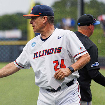 Jun 1, 2024; Lexington, KY, USA; Kentucky Wildcats head coach Nick Mingione shakes hands with Illinois Fighting Illini head coach Dan Hartleb after the game at Kentucky Proud Park. Mandatory Credit: Jordan Prather-Imagn Images