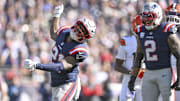 Oct 26, 2025; Foxborough, Massachusetts, USA;  New England Patriots safety Jaylinn Hawkins (21) reacts after making a sack during the first quarter against the Cleveland Browns at Gillette Stadium. Mandatory Credit: Brian Fluharty-Imagn Images