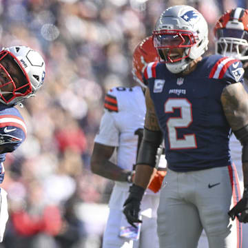 Oct 26, 2025; Foxborough, Massachusetts, USA;  New England Patriots safety Jaylinn Hawkins (21) reacts after making a sack during the first quarter against the Cleveland Browns at Gillette Stadium. Mandatory Credit: Brian Fluharty-Imagn Images