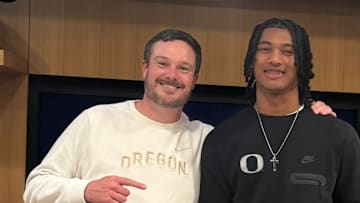Chris Henry Jr. with Oregon coach Dan Lanning