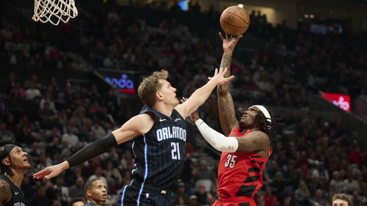 Oct 27, 2023; Portland, Oregon, USA; Portland Trail Blazers center Robert Williams III (35) shoots a basket during the first half against Orlando Magic center Moritz Wagner (21) at Moda Center. Mandatory Credit: Troy Wayrynen-USA TODAY Sports