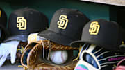 May 24, 2023; Washington, District of Columbia, USA; San Diego Padres hats in the dugout during the game against the Washington Nationals at Nationals Park. Mandatory Credit: Brad Mills-Imagn Images