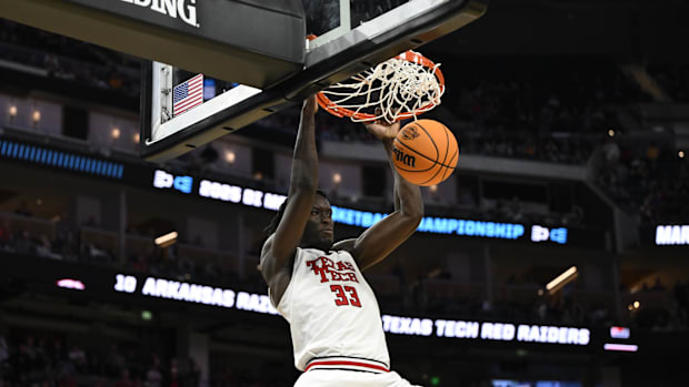 Texas Tech Red Raiders forward Federiko Federiko (33) dunks during the second half against the Arkansas Razorbacks during a W