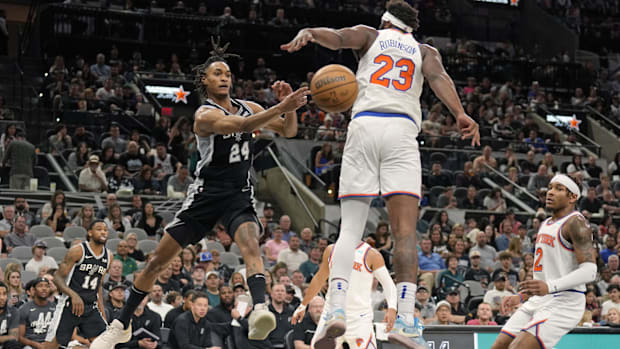 Mar 29, 2024; San Antonio, Texas, USA; San Antonio Spurs guard Devin Vassell (24) passed the ball