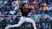 Jun 13, 2025; Omaha, Neb, USA; Oregon State Beavers starting pitcher Dax Whitney (30) pitches against the Louisville Cardinals during the first inning at Charles Schwab Field. Mandatory Credit: Dylan Widger-Imagn Images