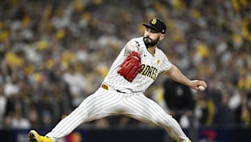 Oct 8, 2024; San Diego, California, USA; San Diego Padres pitcher Tanner Scott (66) throws in the eighth inning against the Los Angeles Dodgers during game three of the NLDS for the 2024 MLB Playoffs at Petco Park.  