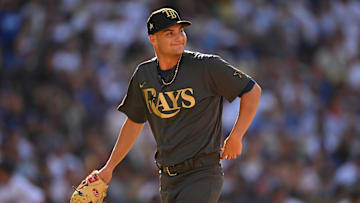 Jul 19, 2022; Los Angeles, California, USA; American League starting pitcher Shane McClanahan (18) of the Tampa Bay Rays reacts after pitching in the second inning against the National League at Dodger Stadium. Mandatory Credit: Jayne Kamin-Oncea-Imagn Images