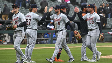 Detroit Tigers line up for high fives in their win against the Chicago White Sox.