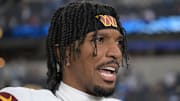 Washington Commanders quarterback Jayden Daniels is interviewed after the game against the Los Angeles Chargers.