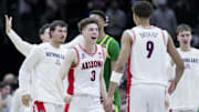 Arizona Wildcats guard Anthony Dell'Orso (3) celebrates with forward Carter Bryant (9) after defeating the Oregon Ducks in the NCAA Tournament.