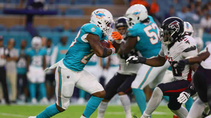 Miami Dolphins running back Jeff Wilson Jr. runs with the football against the Atlanta Falcons during the first quarter at Hard Rock Stadium.