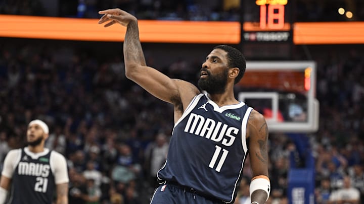 May 26, 2024; Dallas, Texas, USA; Dallas Mavericks guard Kyrie Irving (11) reacts in the second half against the Minnesota Timberwolves during game three of the western conference finals for the 2024 NBA playoffs at American Airlines Center. Mandatory Credit: Jerome Miron-Imagn Images