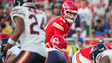 Kansas City Chiefs quarterback Patrick Mahomes (15) goes under center against the Chicago Bears during the first half of the game at GEHA Field at Arrowhead Stadium.