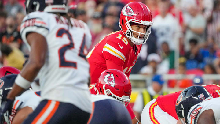 Kansas City Chiefs quarterback Patrick Mahomes (15) goes under center against the Chicago Bears during the first half of the game at GEHA Field at Arrowhead Stadium.