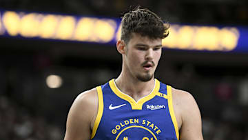 Oct 15, 2024; Las Vegas, Nevada, USA; Golden State Warriors center Quinten Post (21) looks on against the Los Angeles Lakers in the fourth quarter during a preseason game at T-Mobile Arena. Mandatory Credit: Candice Ward-Imagn Images
