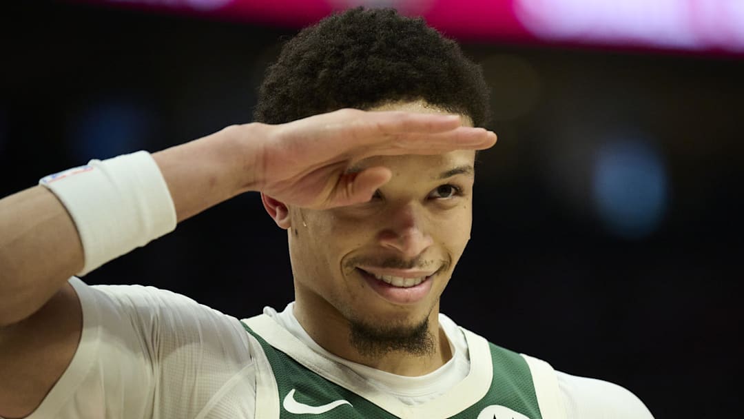 Milwaukee Bucks guard Ryan Rollins (13) salutes a fan during the first half against the Portland Trail Blazers at Moda Center on March 25, 2026. Milwaukee Bucks guard Ryan Rollins (13) salutes a fan during the first half against the Portland Trail Blazers at Moda Center on March 25, 2026.