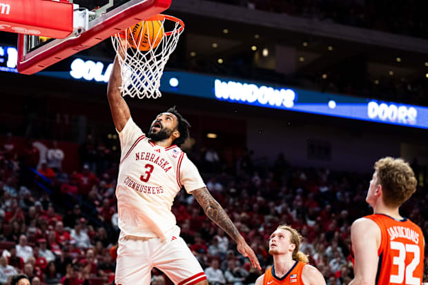 Nebraska Cornhuskers guard Brice Williams (3) dunks the ball against Illinois Fighting Illini forward Jake Davis (15).