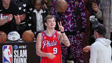 Feb 18, 2023; Salt Lake City, UT, USA; Philadelphia 76ers guard Mac McClung (9) reacts in the Dunk Contest during the 2023 All Star Saturday Night at Vivint Arena. Mandatory Credit: Kirby Lee-Imagn Images