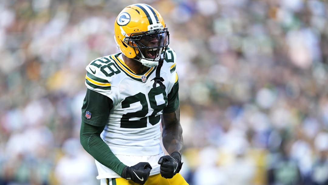 Aug 23, 2025; Green Bay, Wisconsin, USA; Green Bay Packers linebacker Isaiah Simmons (28) reacts to tackling Seattle Seahawks running back Jacardia Wright (31) during the second half at Lambeau Field.