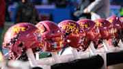 Nov 9, 2024; Kansas City, Missouri, USA; Iowa State Cyclones helmets on the bench during the first quarter against the Kansas Jayhawks at GEHA Field at Arrowhead Stadium. 