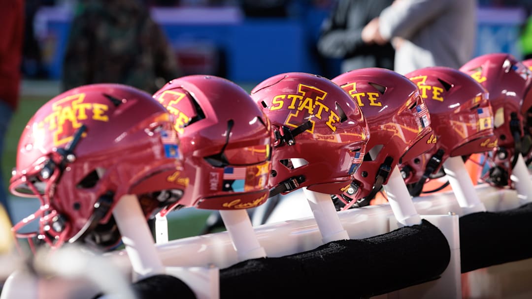 Nov 9, 2024; Kansas City, Missouri, USA; Iowa State Cyclones helmets on the bench during the first quarter against the Kansas Jayhawks at GEHA Field at Arrowhead Stadium. Mandatory Credit: William Purnell-Imagn Images
